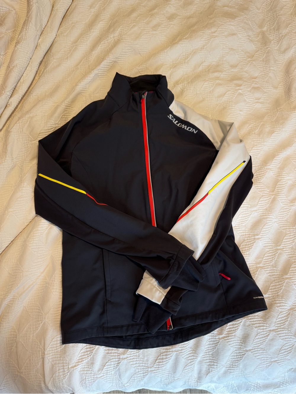 Salomon Black Performance Jacket with White Sleeve and Red Zipper